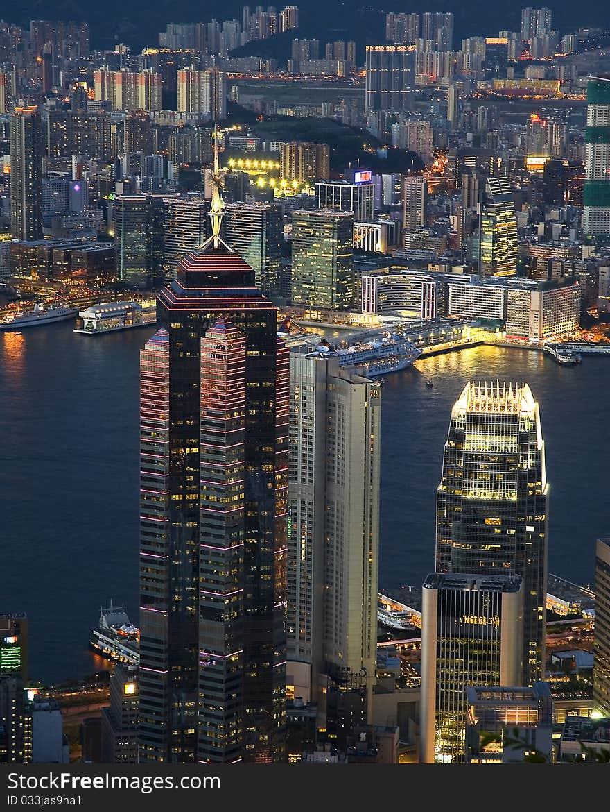 Victoria harbour and adjacent skyscrapers night scene taken from Victoria Peak. Victoria harbour and adjacent skyscrapers night scene taken from Victoria Peak.