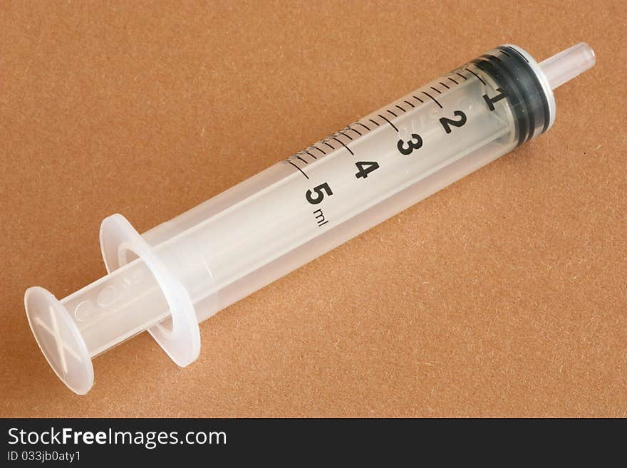 Plastic syringe