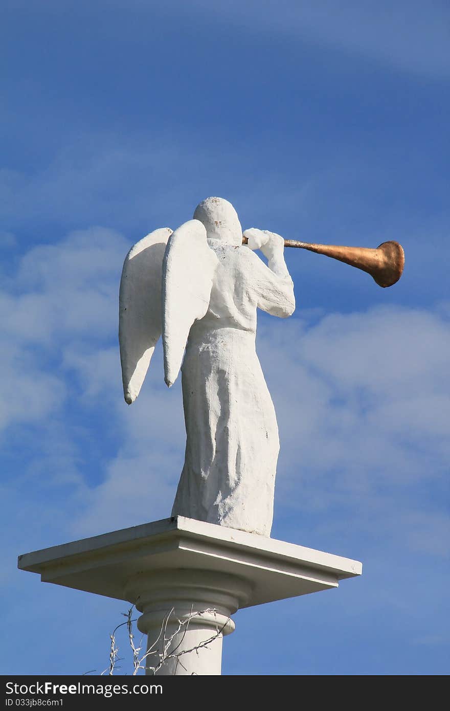 A white angel with trumpet. A white angel with trumpet