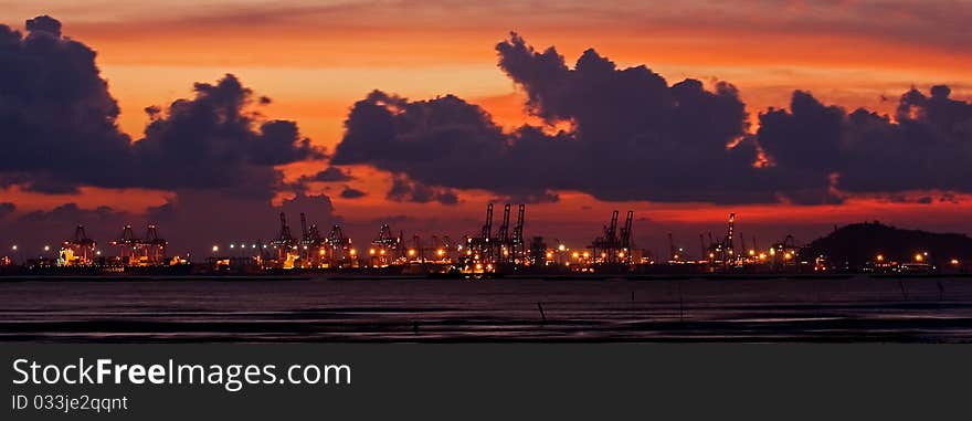 Container port silhouette taken at Shekou Port, Shenzhen, China. Container port silhouette taken at Shekou Port, Shenzhen, China.