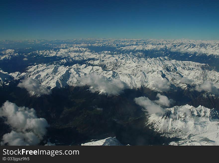 I photo the alps mountain in the airplane. It is great and gorgeous.