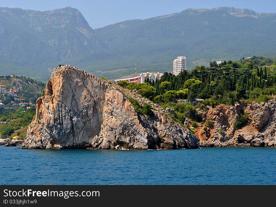 Black sea coast and small rock. Black sea coast and small rock