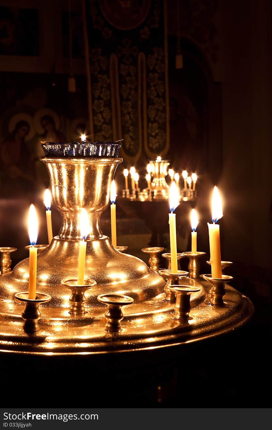 Candles and a lamp burning in the church.