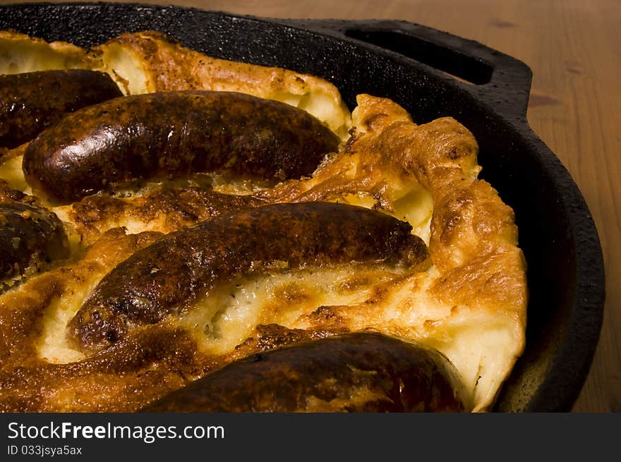 Toad in the hole (British sausage in batter mix)