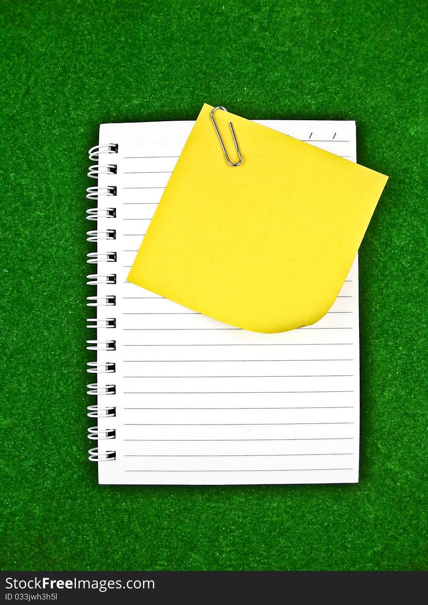 Yellow note and notebook Paper