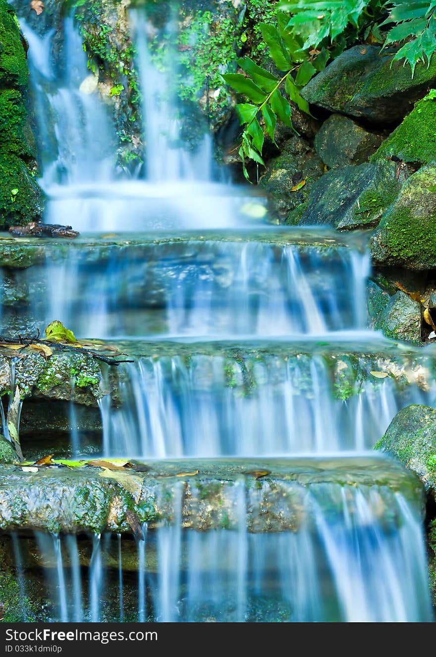 Beautiful veil cascading waterfalls, mossy rocks