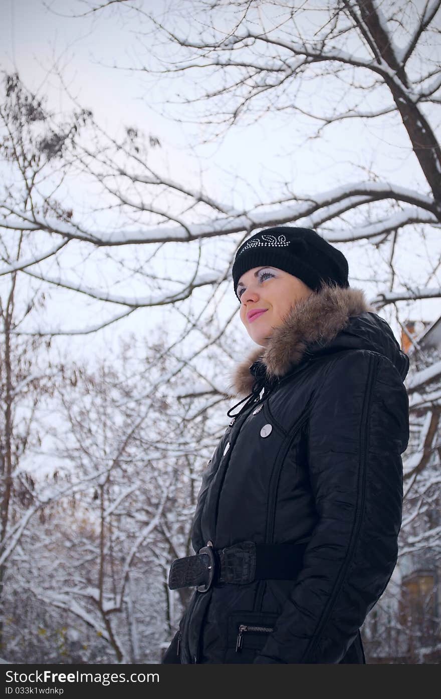 The Girl Against Winter Trees