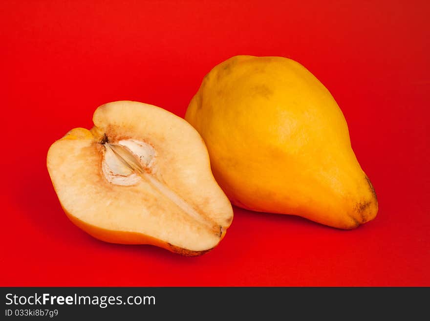 Yellow quinces in isolated on background. Yellow quinces in isolated on background