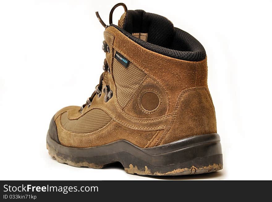 Trekking shoes and a white background