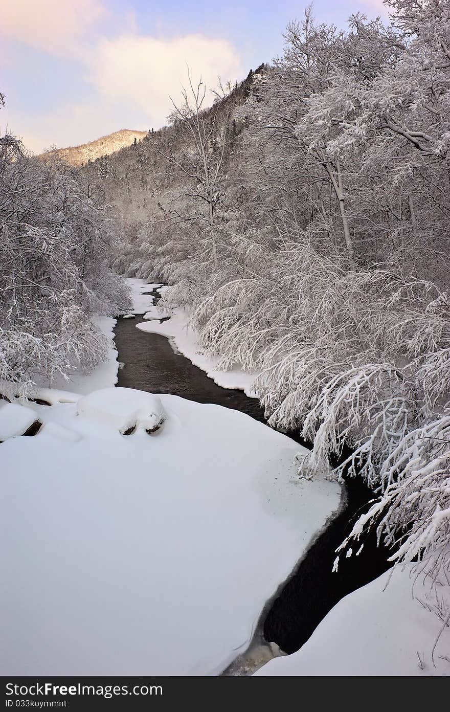 Mountain stream after a heavy snowfall. Mountain stream after a heavy snowfall.