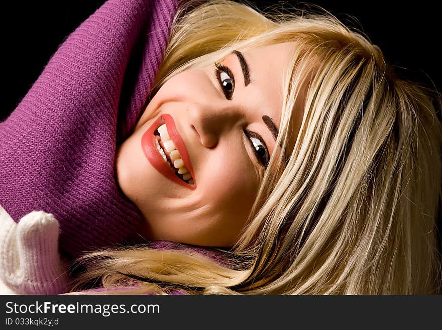 Smiling woman with violet scarf