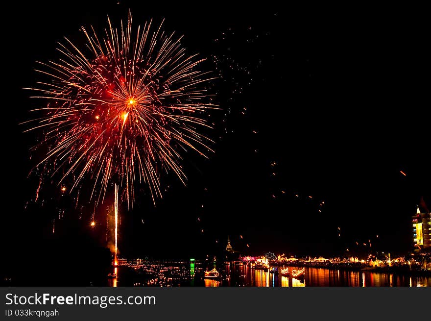 Colorful Fireworks in night at Bangpakong river, Chachoengsao province, Thailand.