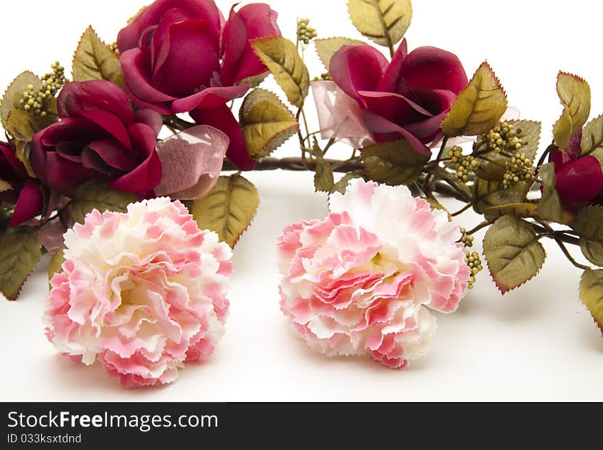 Carnations and branch with red roses. Carnations and branch with red roses