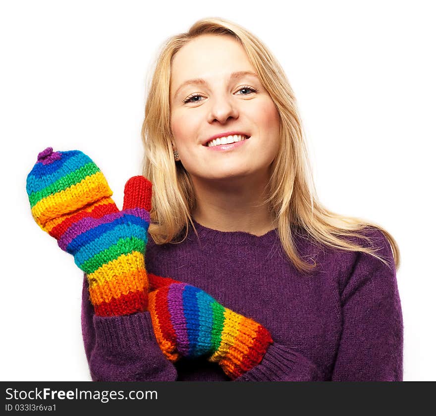 Beauty young woman blonde in colorful gloves