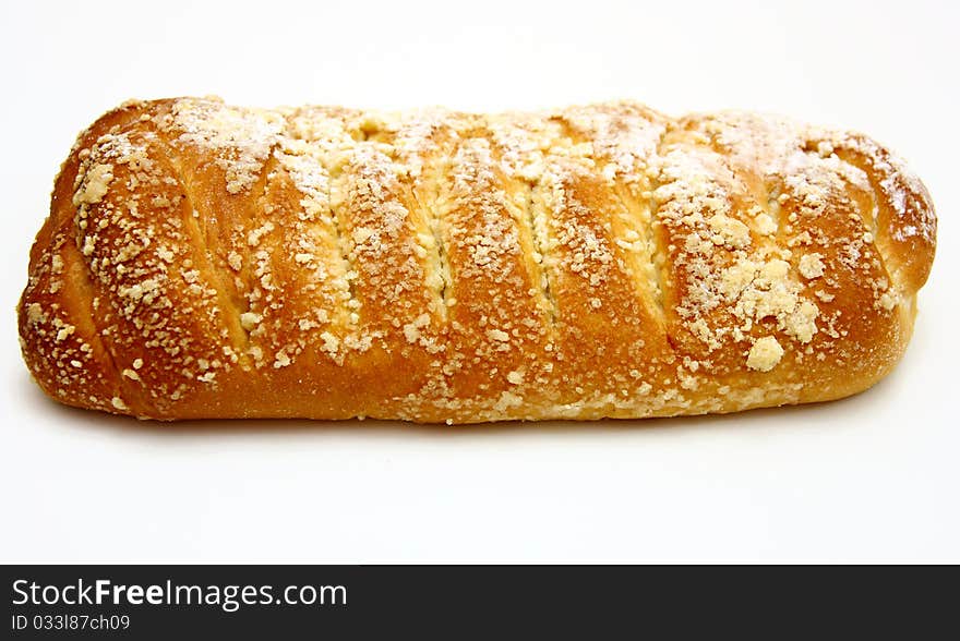 Tasty juicy bread lies on a white background