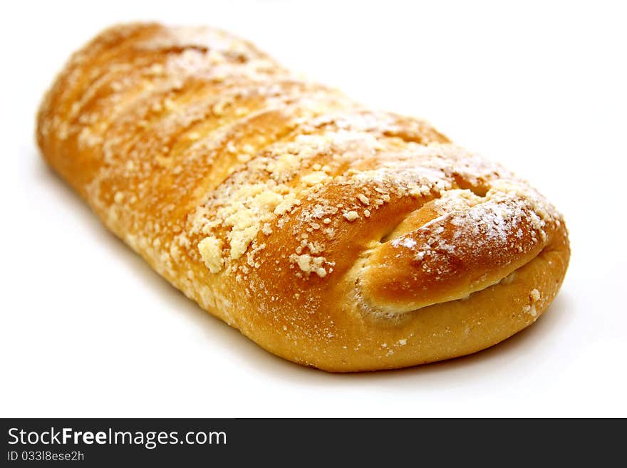 Tasty juicy bread lies on a white background