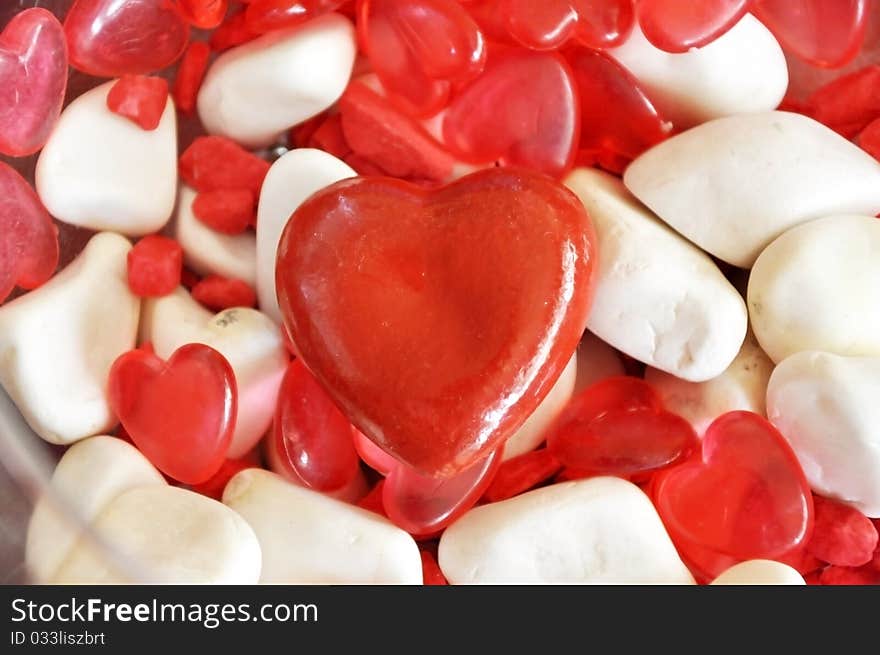 Handmade red heart shape and the white stones