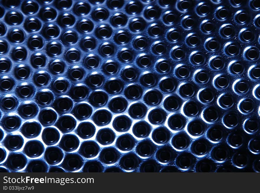 Holes on the stainless steel wash drum of a washing machine. Holes on the stainless steel wash drum of a washing machine