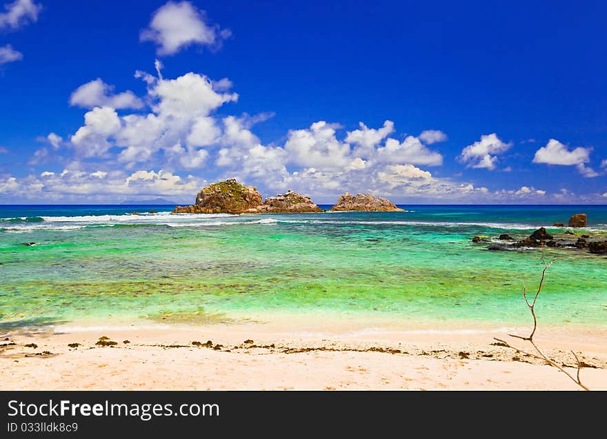 Stones At Ocean At Seychelles