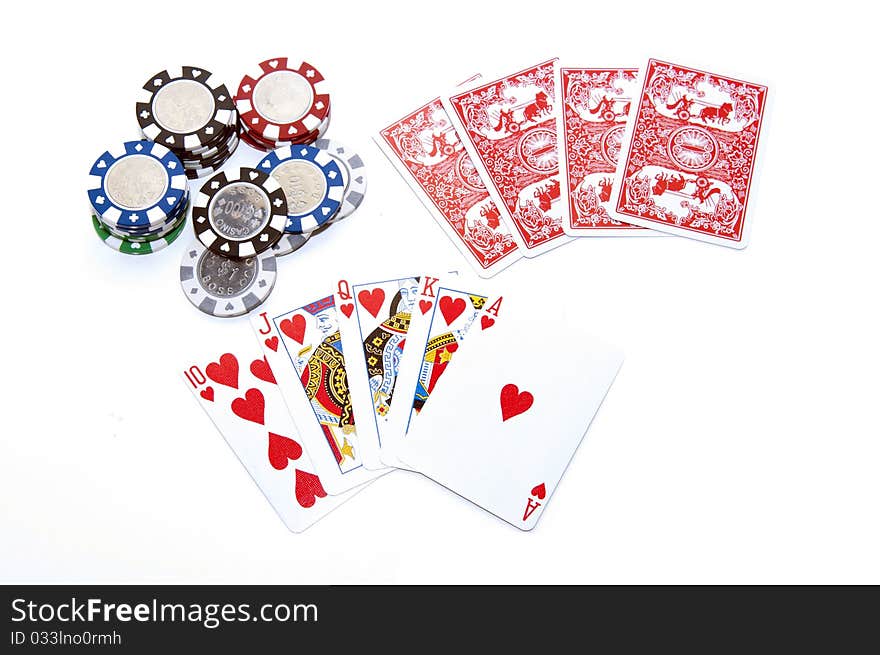 Poker royal flush with chips on white background