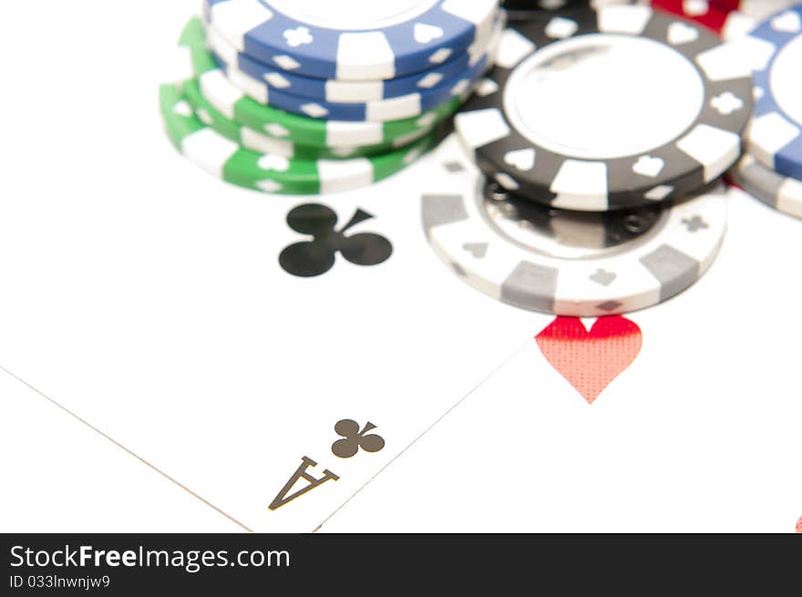 Aces with poker chips on white background