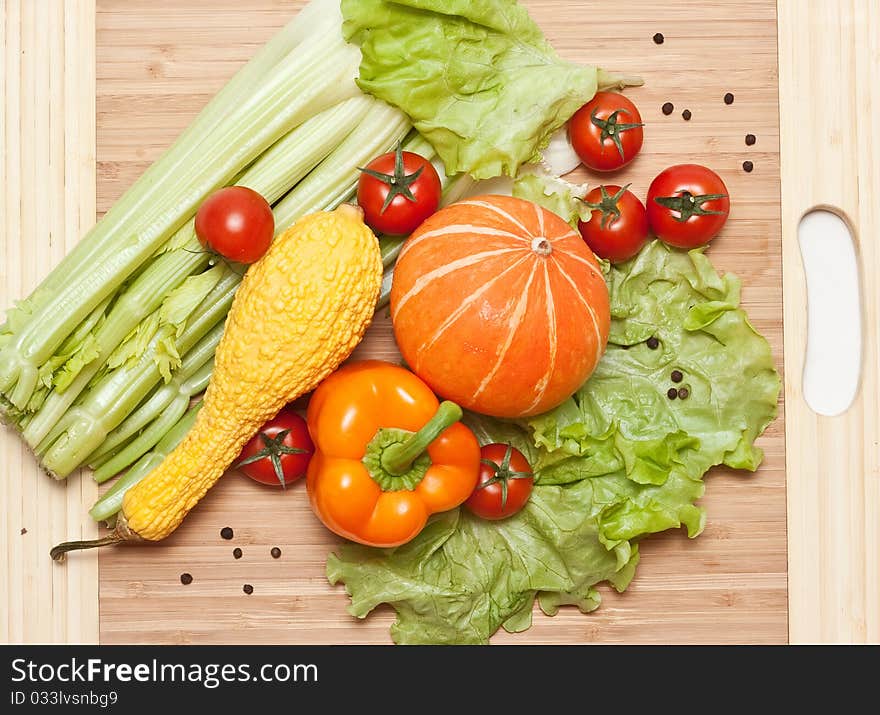 Tomatos cherry, pepper. green salad and pumpkin. Tomatos cherry, pepper. green salad and pumpkin