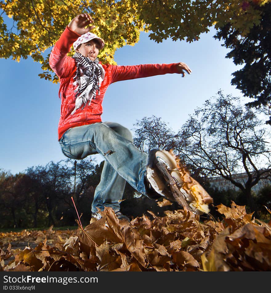 Wide-angle shot of a sliding rollerskater - motion blur on person. Wide-angle shot of a sliding rollerskater - motion blur on person