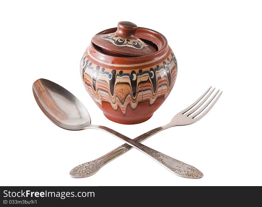 Clay pottery pot isolated on a white background