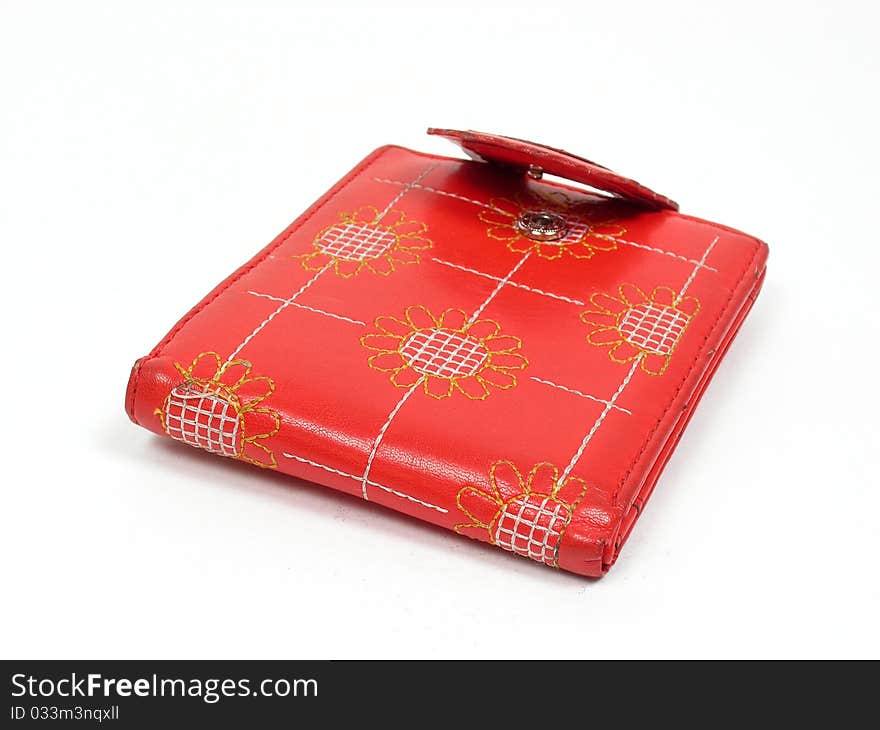 Red leather purse on a white background