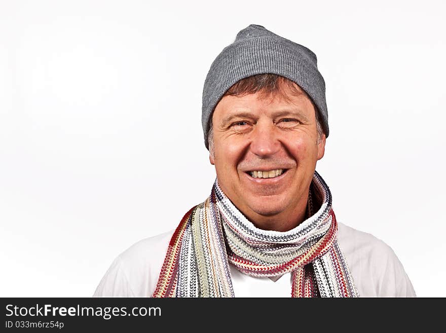 Smiling man with cap isolated on a white background. Smiling man with cap isolated on a white background