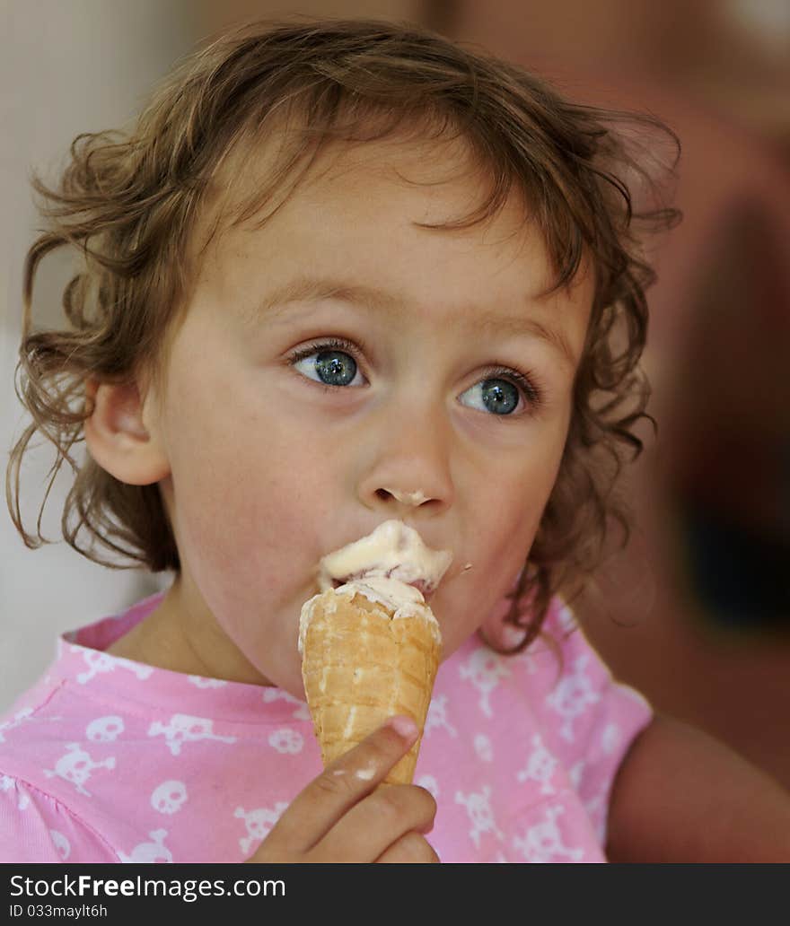 Cute little girl eating ice cream. Cute little girl eating ice cream