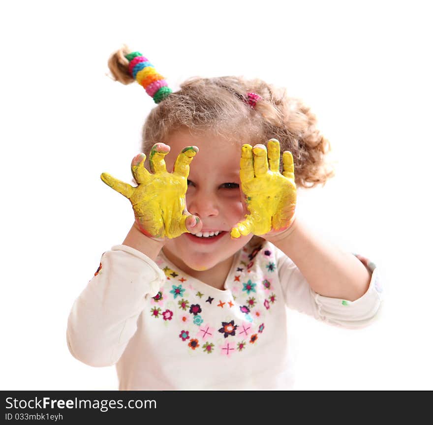 Girl with paint hands isolated on white background