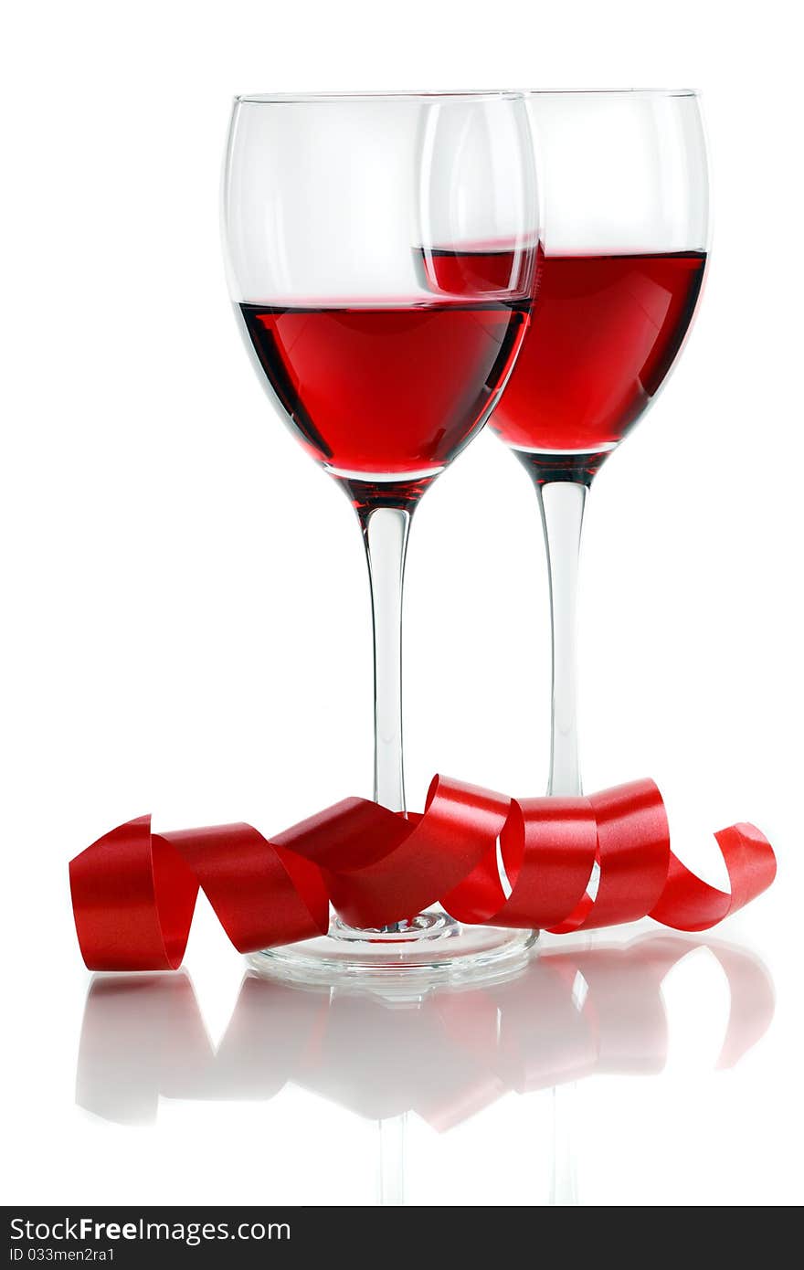 Glass of red wine on a white background and with soft shadow