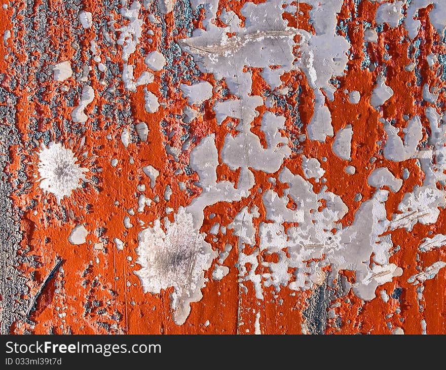 Red peeling paint on concrete wall background. Red peeling paint on concrete wall background.