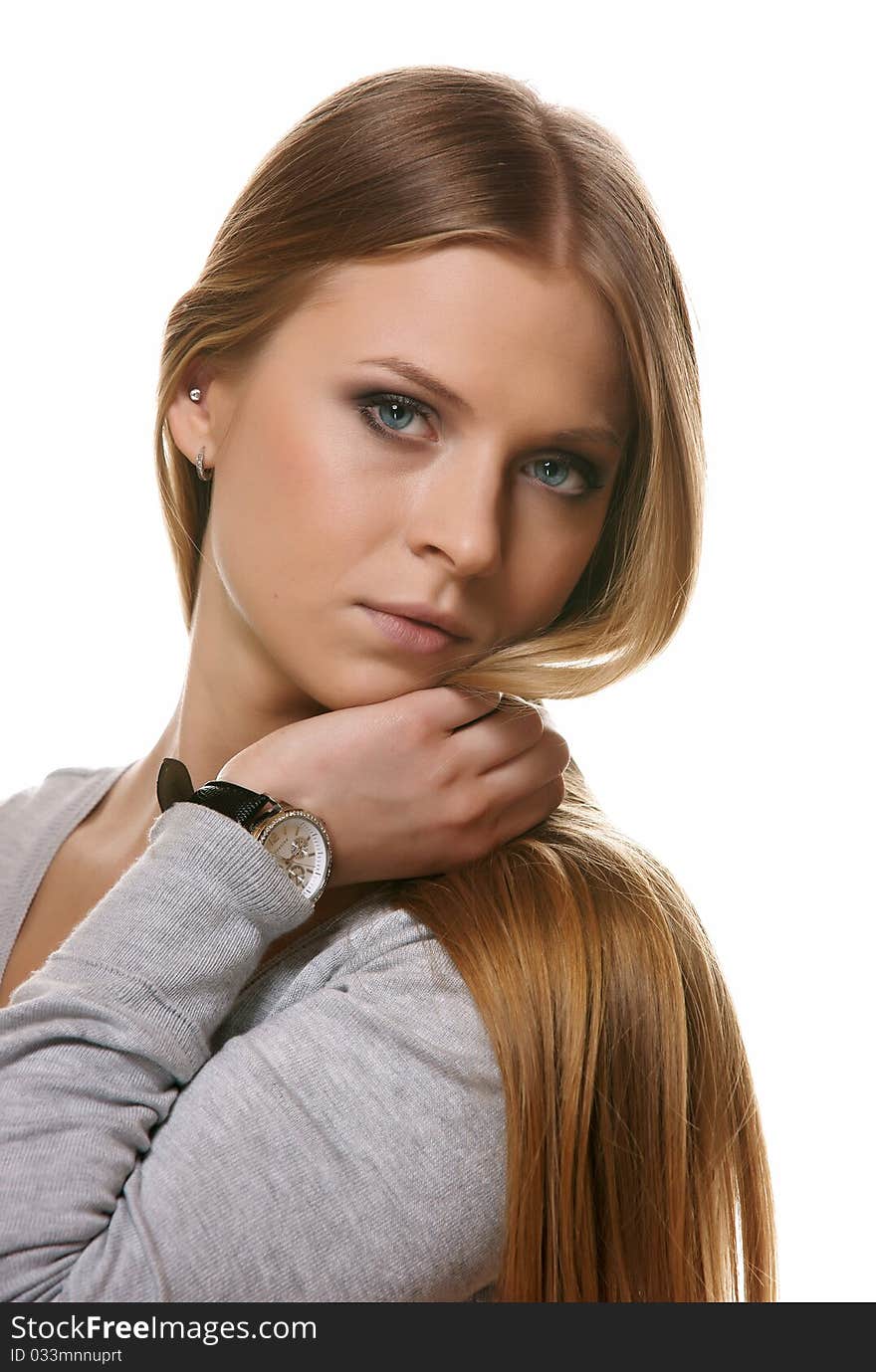 Portrait of the blonde on a white background