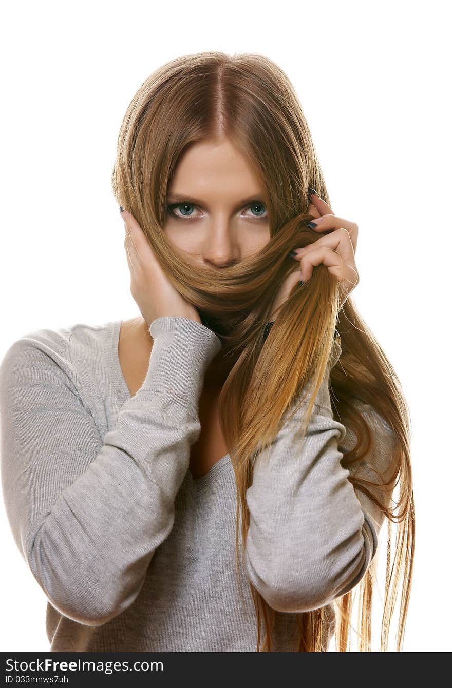 Portrait of the blonde on a white background