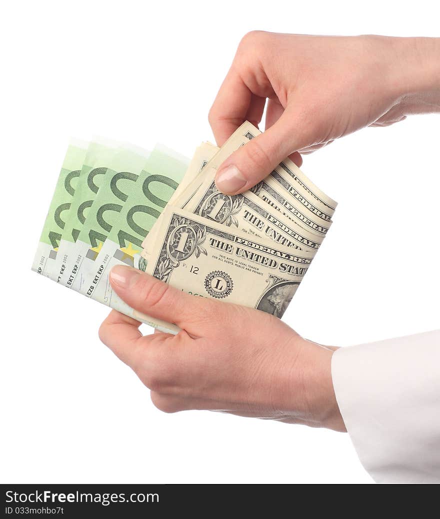 Close-up of female hands holding banknotes: choosing dollar; isolated on white