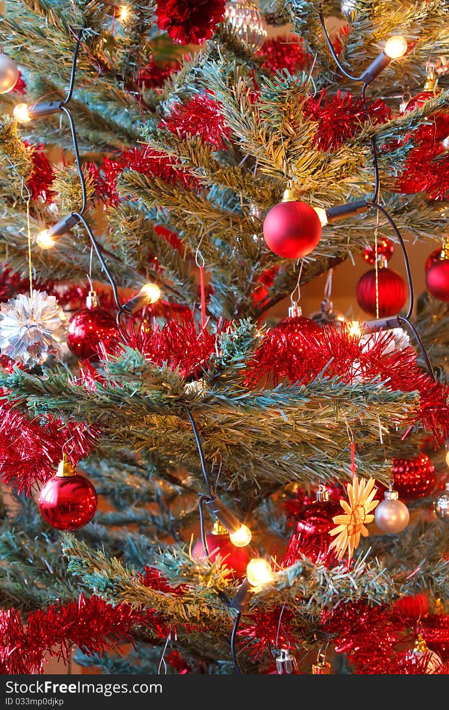 Detail of Christmas decoration on tree with light