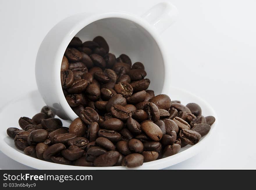 Cup with coffee beans