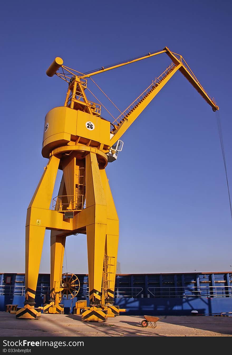 Dock crane used to unload cargo ships. Dock crane used to unload cargo ships