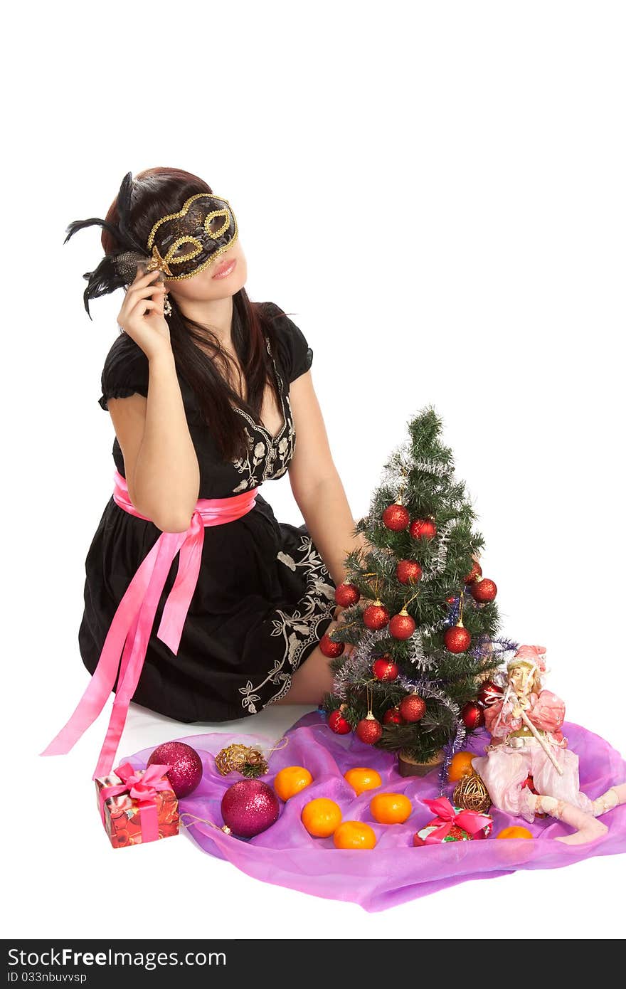 Young beautiful woman with a Christmas gift.