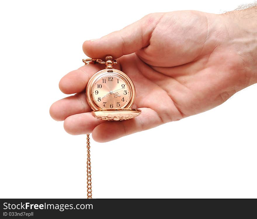 Golden pocket watch in hand isolated on white. Golden pocket watch in hand isolated on white