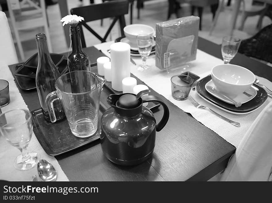 Display of luxury expensive designer dining set on a table,in black and white