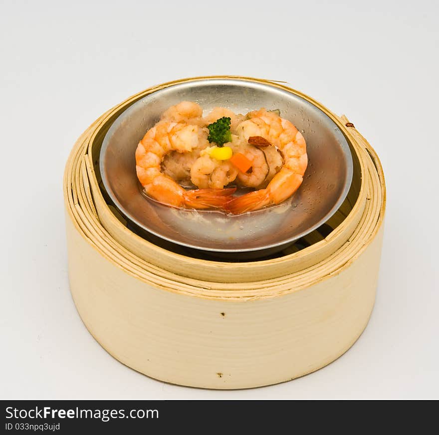 Chinese streamed shrimp dimsum in bamboo containers traditional cuisine. Chinese streamed shrimp dimsum in bamboo containers traditional cuisine