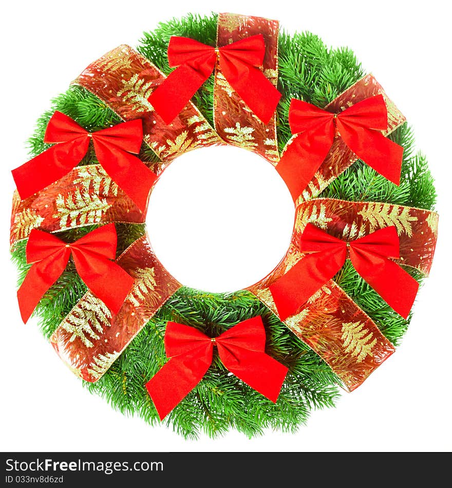 Green round Christmas wreath on white background