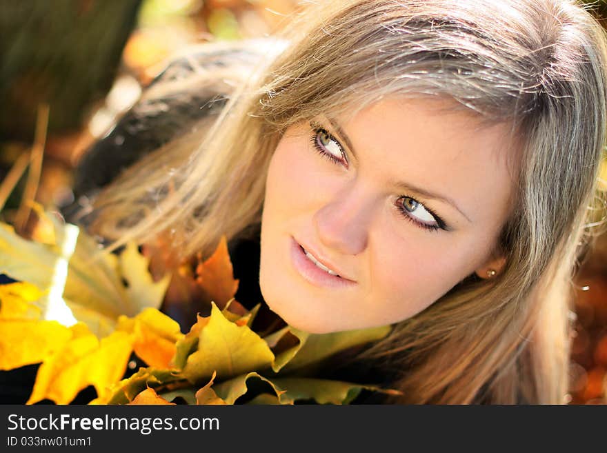 Young beautiful woman with the nature, autumn. Young beautiful woman with the nature, autumn.