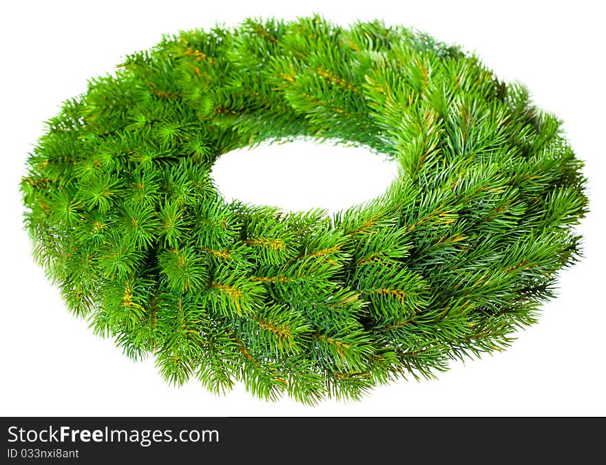 Green round Christmas wreath on white background