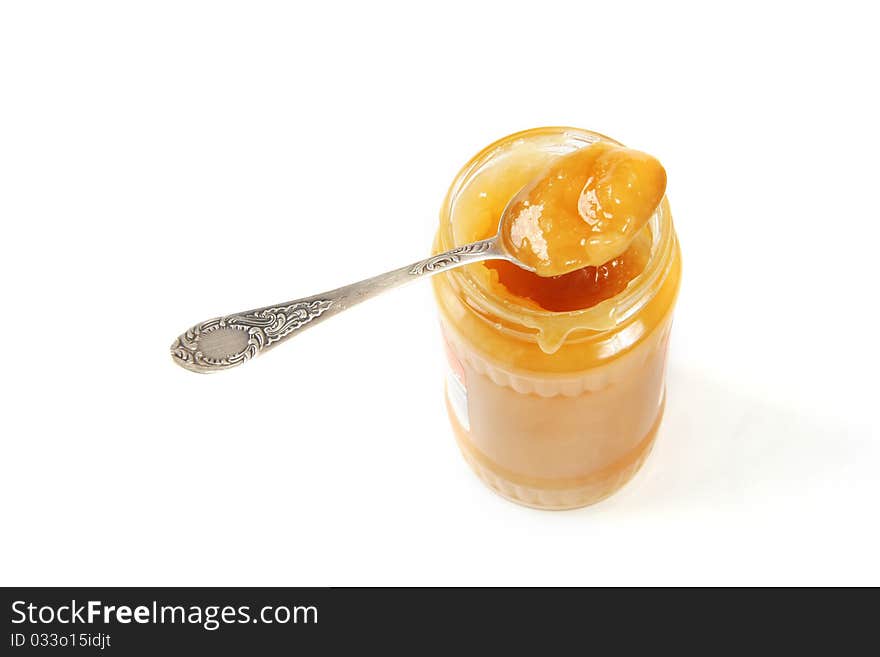 Honey in the jar with spoon