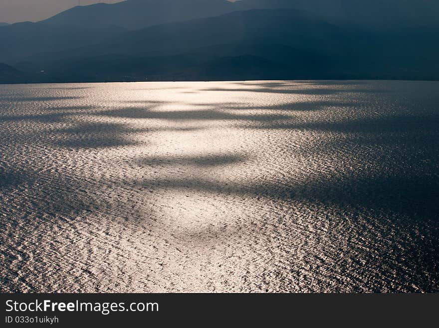 Cloud shadows on the sea, Nafplio, Peloponnese, Greece. Cloud shadows on the sea, Nafplio, Peloponnese, Greece