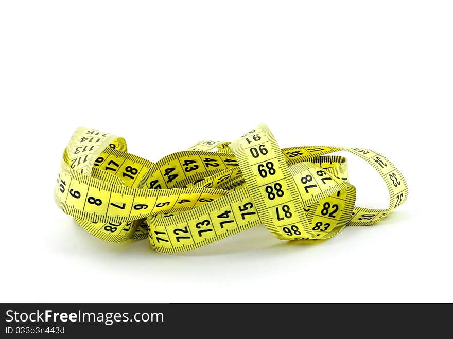 Close-up of a measuring tape against a white background